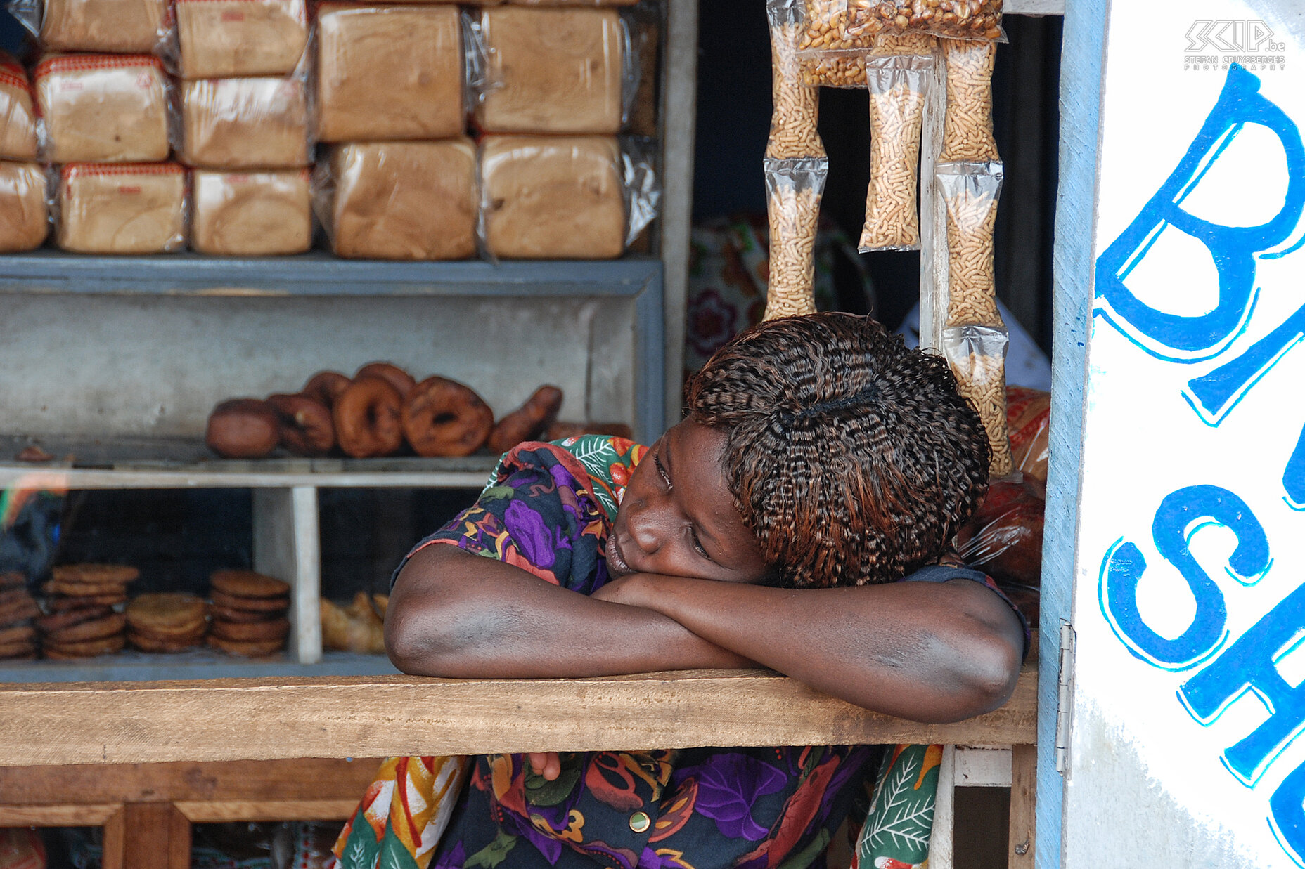 Entebbe - Saleswoman of baker's shop A saleswoman in the baker's shop is waiting for her customers. Stefan Cruysberghs